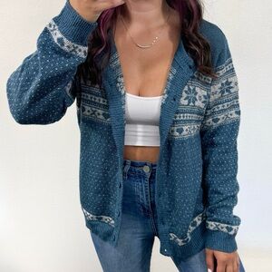 Blue and white snowflake knit cardigan sweater